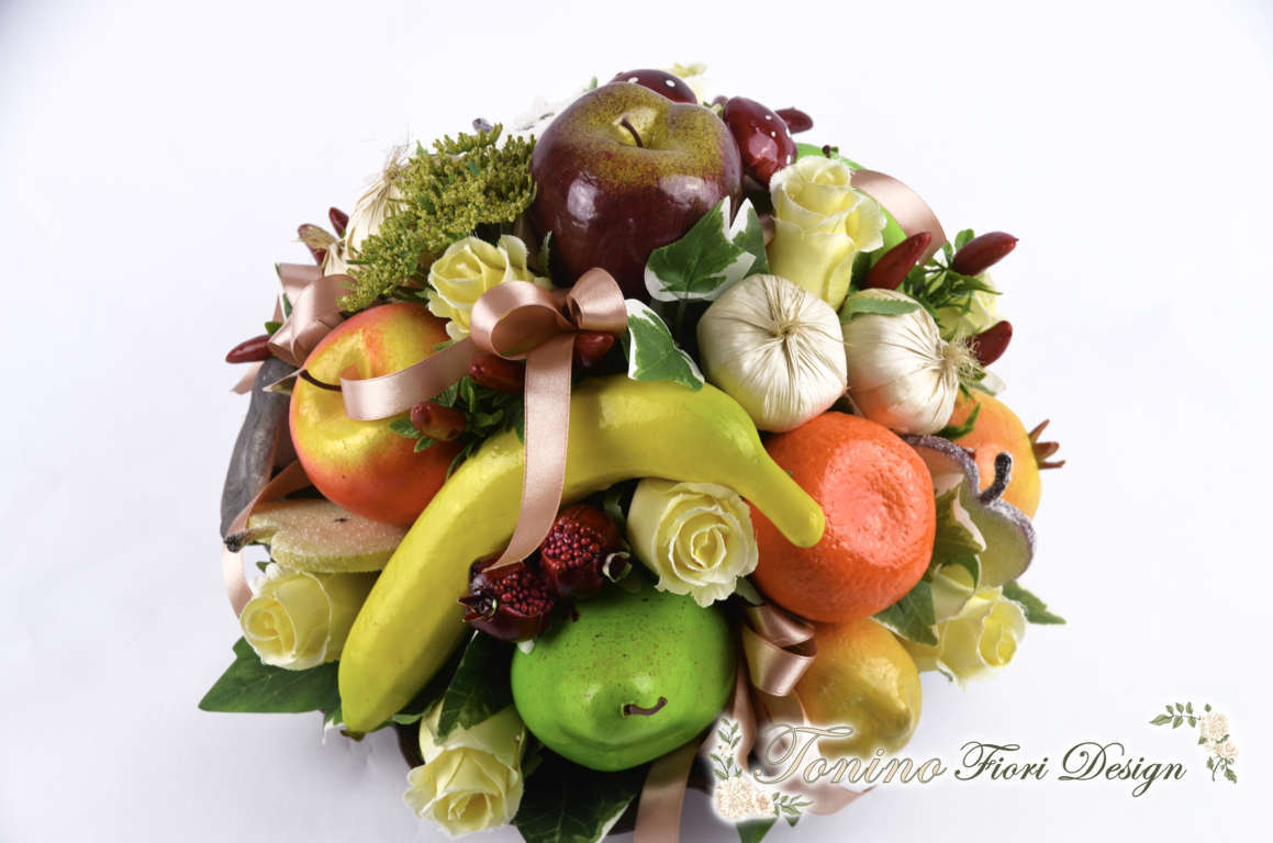 Centro tavolo terracotta frutta e fiori