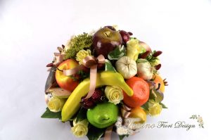 Centro tavolo terracotta frutta e fiori